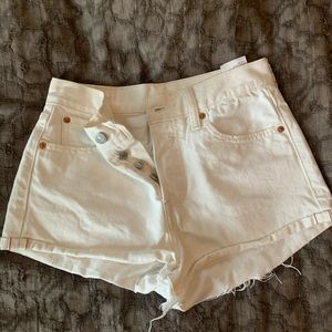 White Levi cutoffs